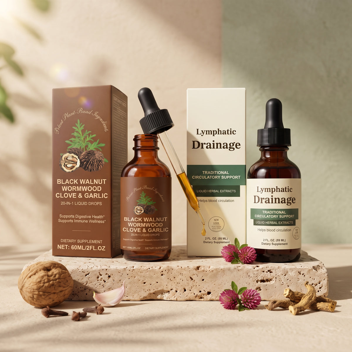 A studio-style display of Luma's Black Walnut Wormwood Clove & Garlic dropper bottle and Lymphatic Drainage dropper bottle, pictured with their branded packaging on a rough sandstone slab alongside natural walnuts, garlic, cloves, and dried herbs.